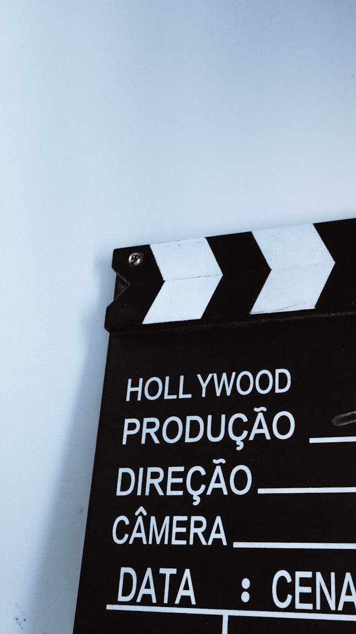hero-img-01 Close-up vertical shot of a clapperboard with text, ideal for film and media themes.